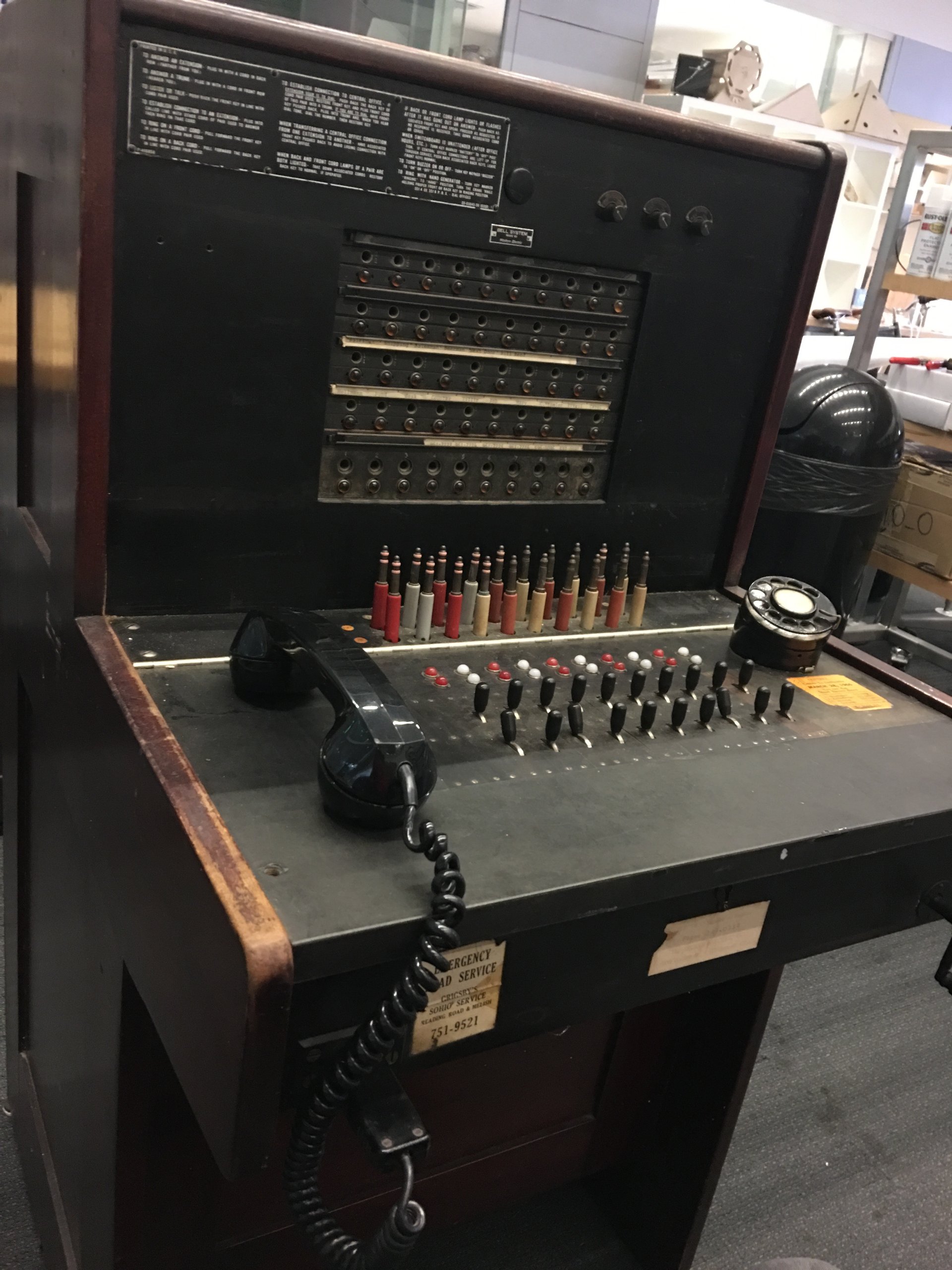 The restored 1927 Western Electric 551-A switchboard, with its handset and patch cords.